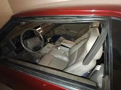 Red Auction Car Side View