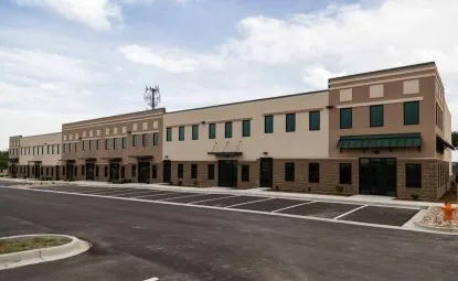 Parking spaces next to a storage facility.