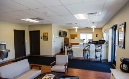 Interoffice of a storage facility with couches and chairs.