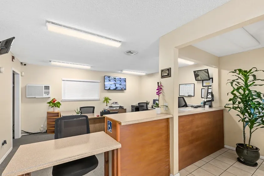 Interior white desk and office at a storage facility.