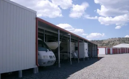 Outdoor covered vehicle storage.