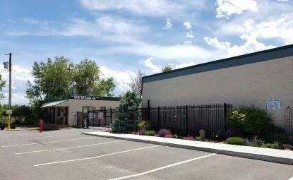 Parking spots near a storage facility office.