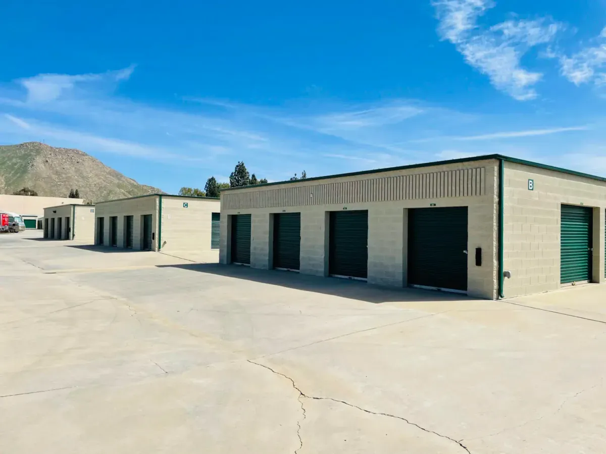 Clusters of green outdoor storage units.