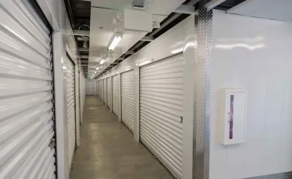 Hallway and corner at an indoor storage facility.