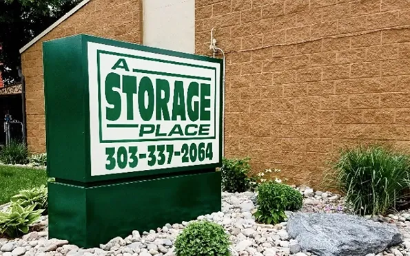 A storage place green small sign.
